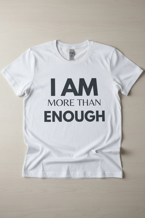 White unisex tee with bold black text reading I Am More Than Enough